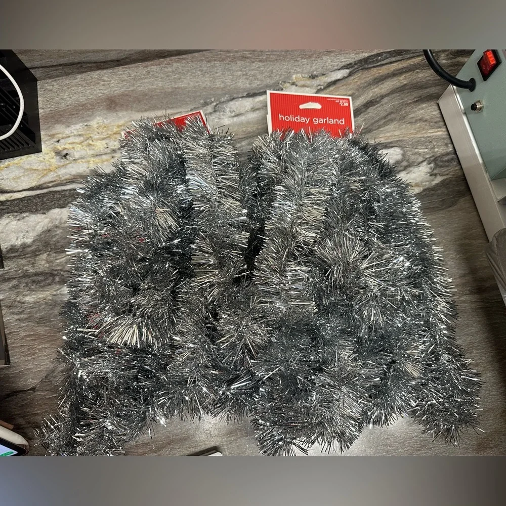 2 strands of silver holiday garland